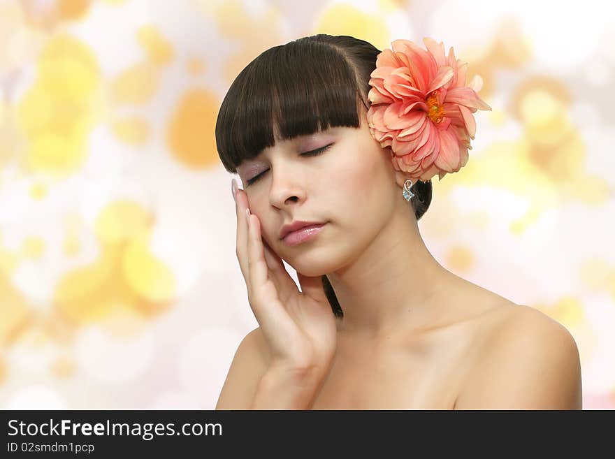 Front view of young beautiful woman's face with healthy fresh clean skin