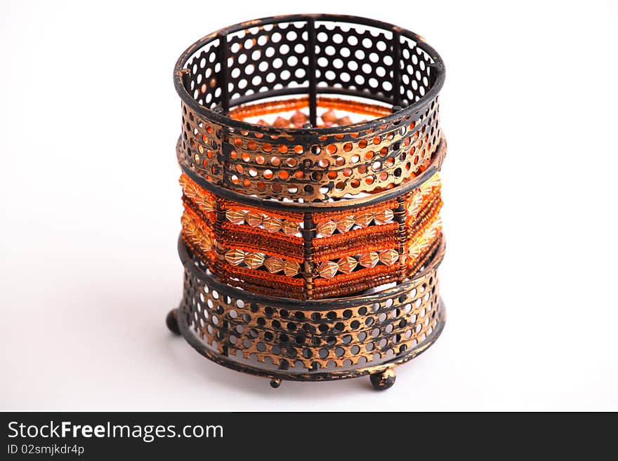 Isolated old-style candlestick on white background