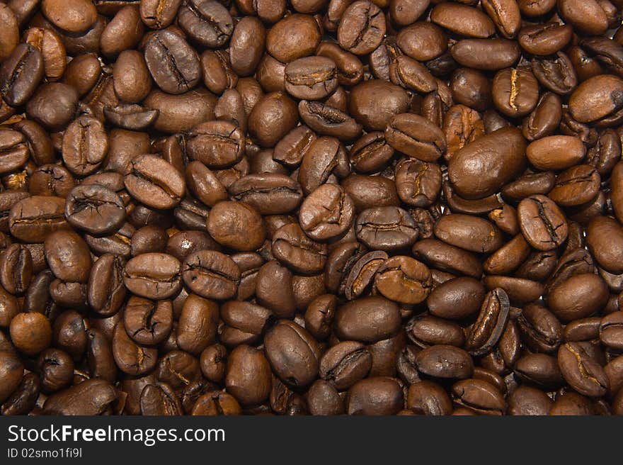 Raw coffee beans filled all frame of photo. Raw coffee beans filled all frame of photo