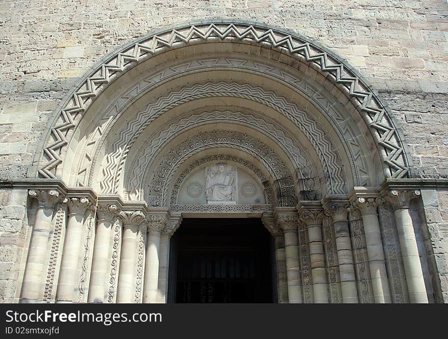 An arched church doorway with gothic carvings ,Nancy, France. An arched church doorway with gothic carvings ,Nancy, France.