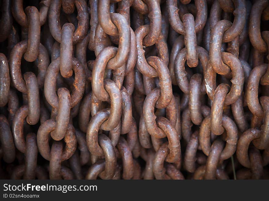 Thick Rusty Chain Background with Vignette