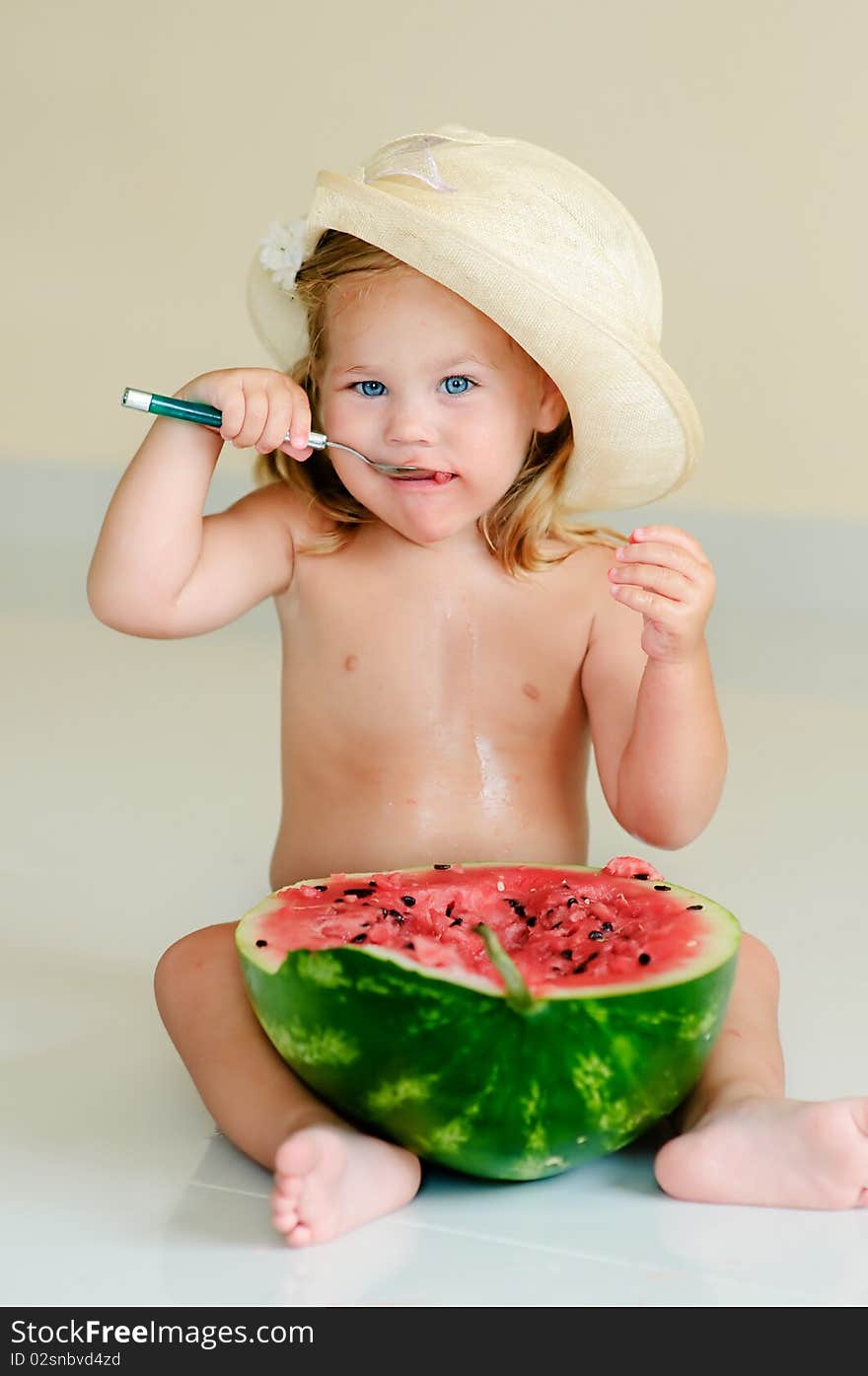 Funny girl eating with appetite ripe watermelon. Funny girl eating with appetite ripe watermelon