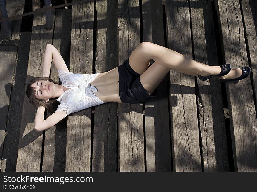 Beautiful girl lying on the stairs