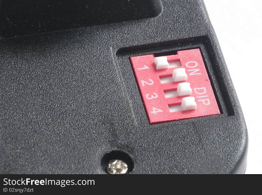 Close up view of dip switches on an electronic component. Close up view of dip switches on an electronic component.