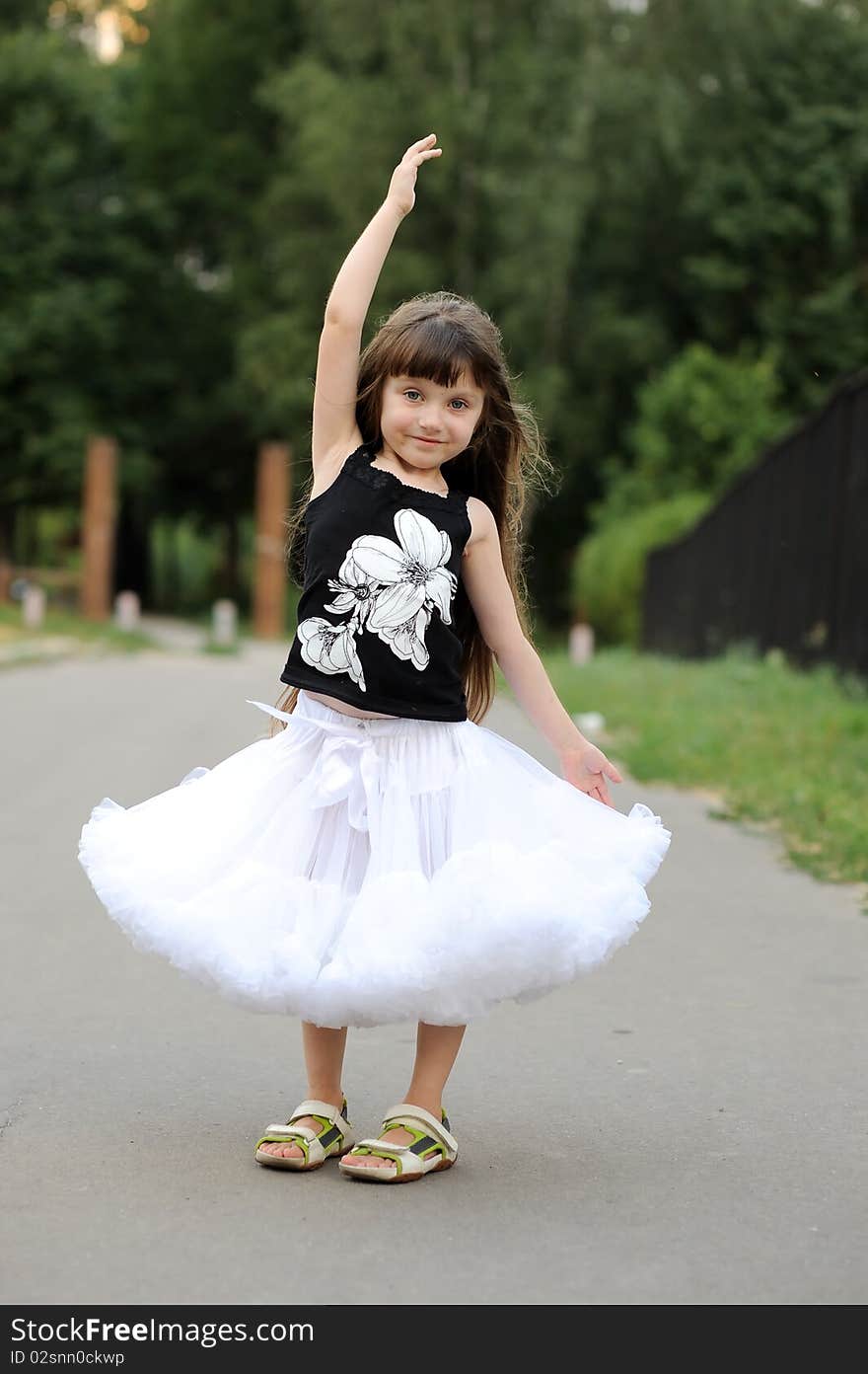 Adorable toddler girl with very long dark hair