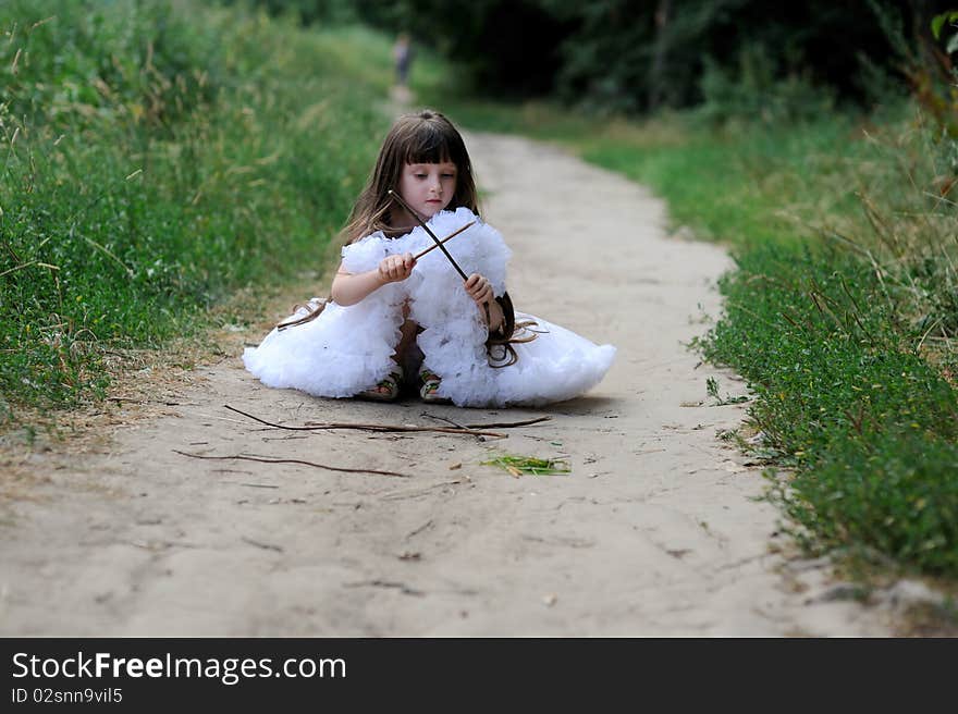 Adorable toddler girl with very long dark hair