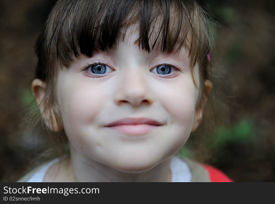 Nice Toddler Girl With Blue Eyes