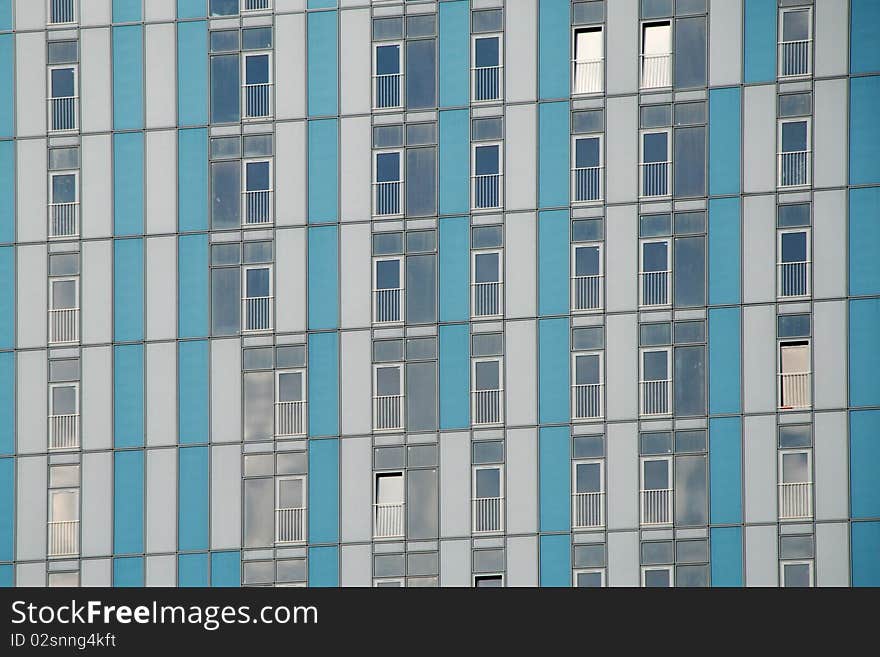 Window texture on the blue big building. Window texture on the blue big building