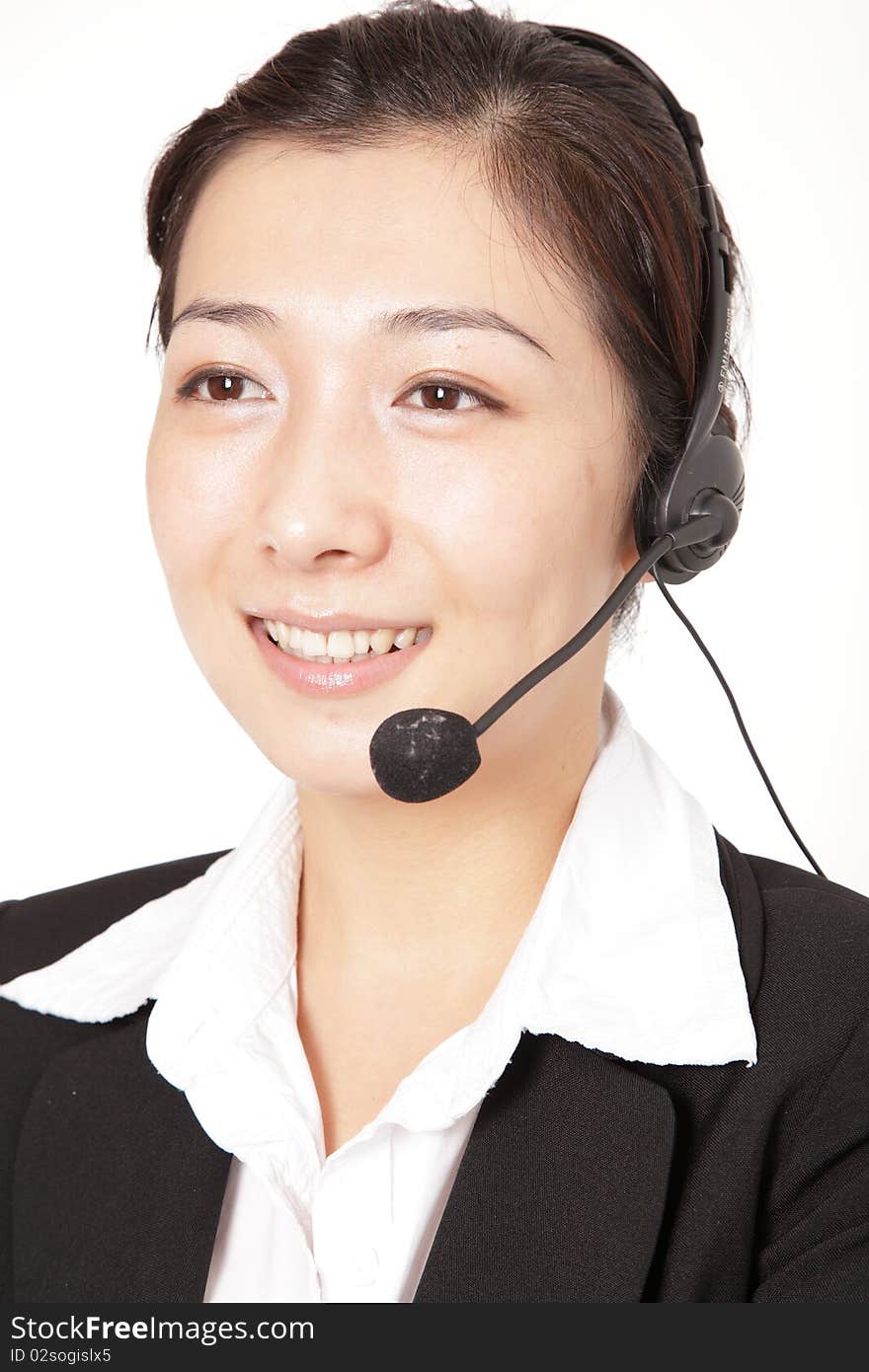 A smiling business woman talking on the phone