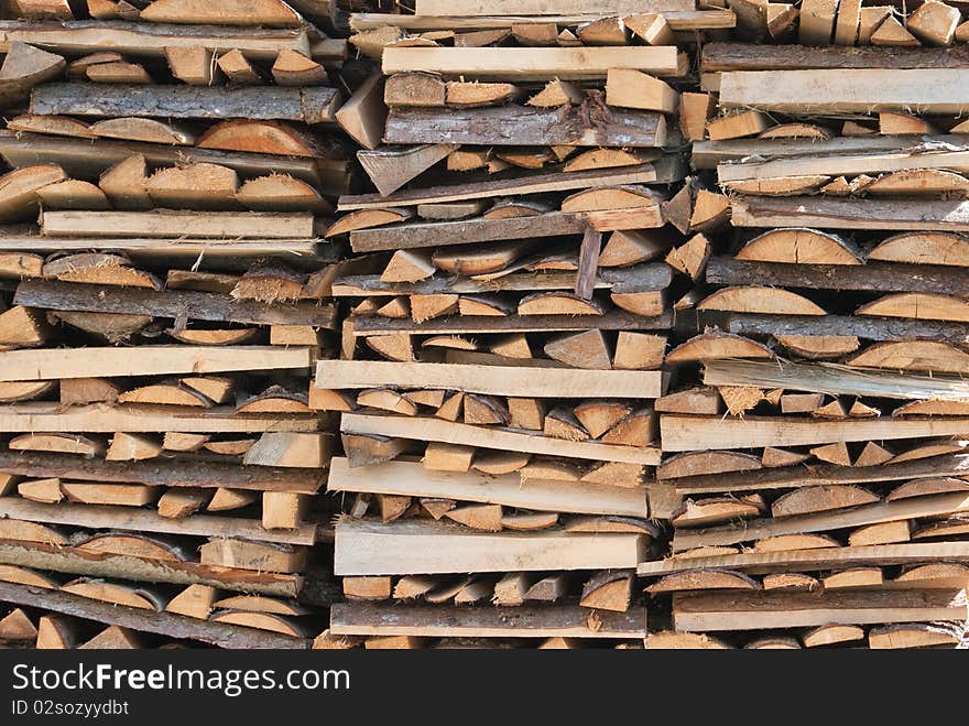 Texture. Harvesting firewood for the fireplace