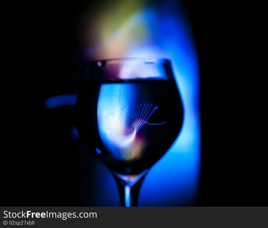 Glass cup on a colored background. Glass cup on a colored background