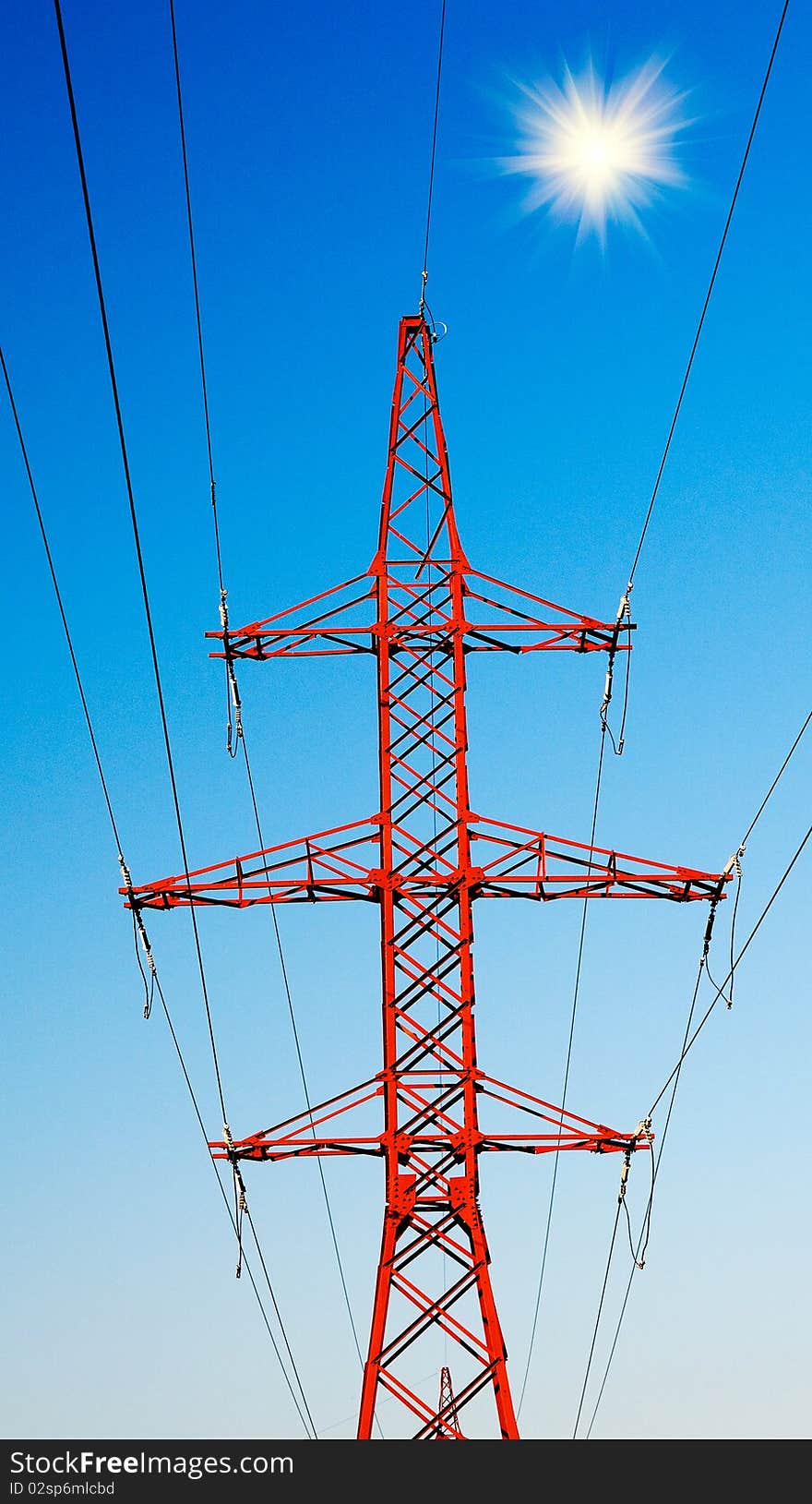 Blue sky and electrical pylon.