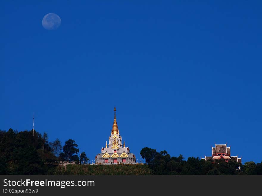 Temple on top of the mountain under moon. Temple on top of the mountain under moon