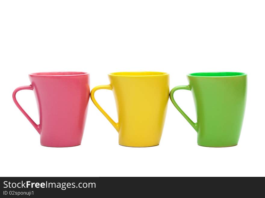 Beautiful color mugs on a white background