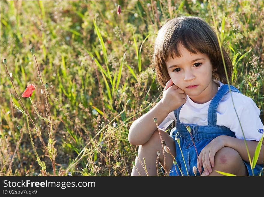 Little girl in poppies