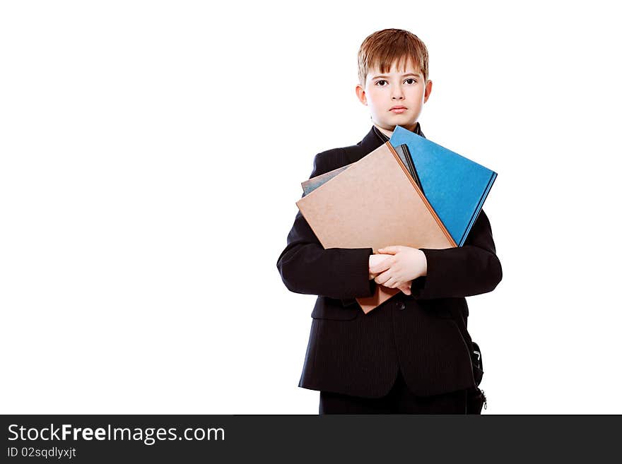 Educational theme: boy teenager with books. Isolated over white background. Educational theme: boy teenager with books. Isolated over white background.