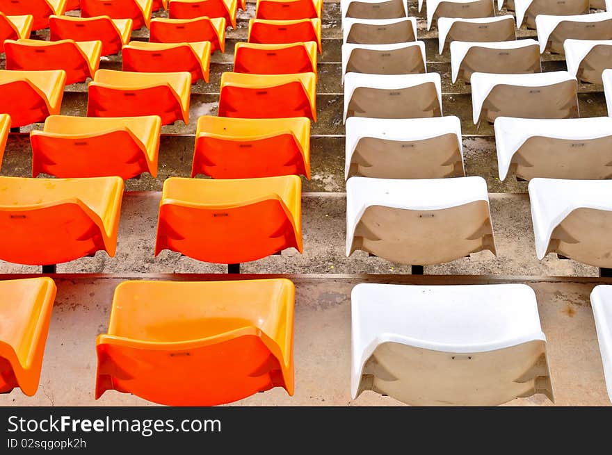 Orange and white seat in stadium