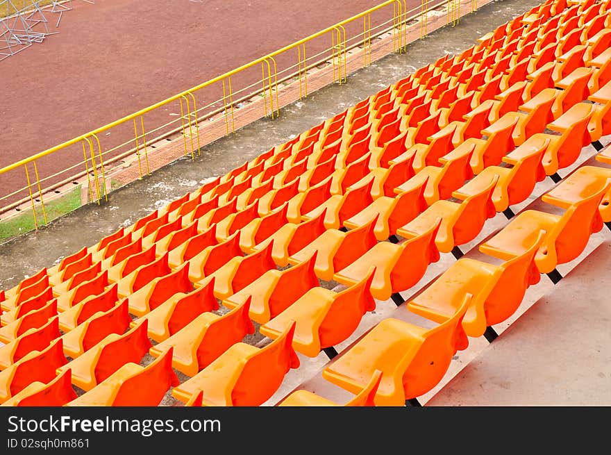 Orange and white seat in stadium