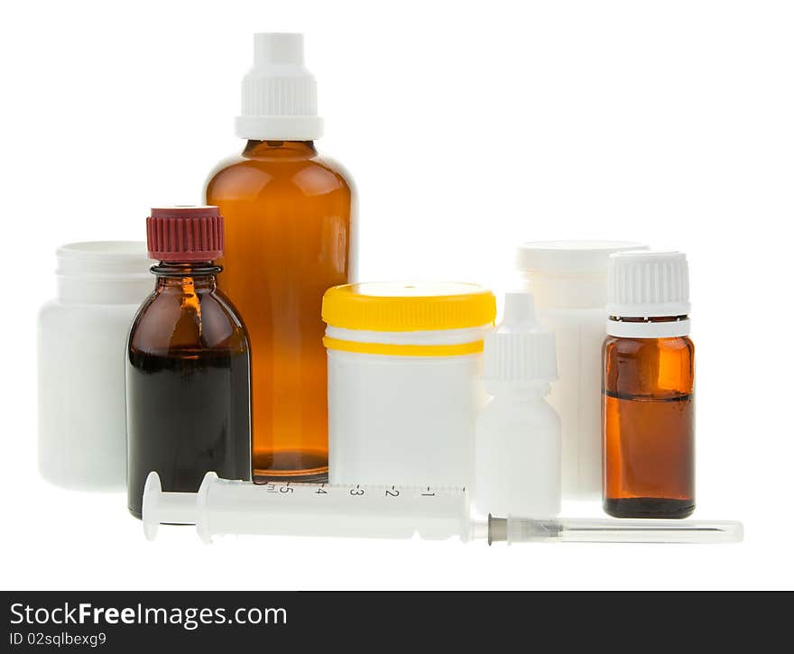 Medical supplies - vial bottles and pills on white background. Medical supplies - vial bottles and pills on white background