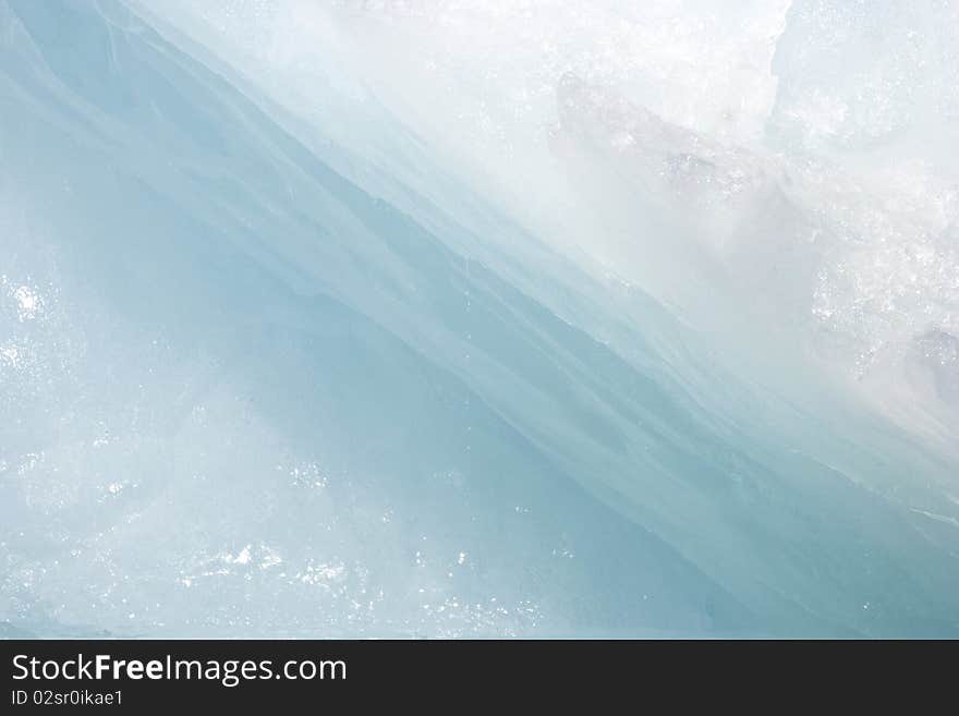 Closeup of pure, sunlit blue ice of iceberg at Jokusarlon Glacial Lagoon, Iceland. Closeup of pure, sunlit blue ice of iceberg at Jokusarlon Glacial Lagoon, Iceland