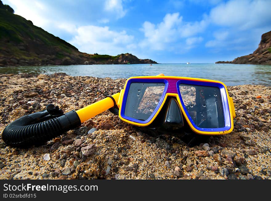 Diving mask and snorkel on the beach in summer. Diving mask and snorkel on the beach in summer