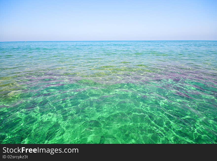 Seashore with waves and foam