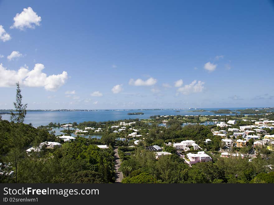 View of tropical island from above a hilltop. View of tropical island from above a hilltop