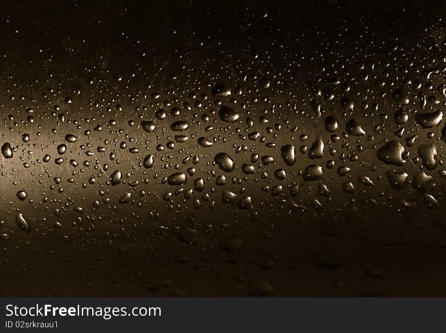 Water drops on the metal