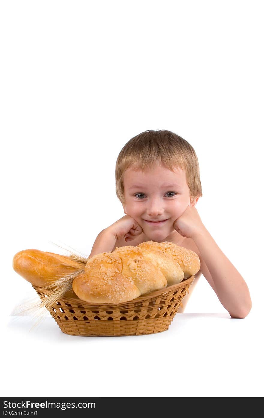 Happy boy with the bread on a white background