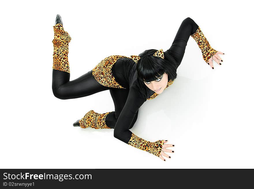 Young woman dancer is in a cat image on white. Young woman dancer is in a cat image on white