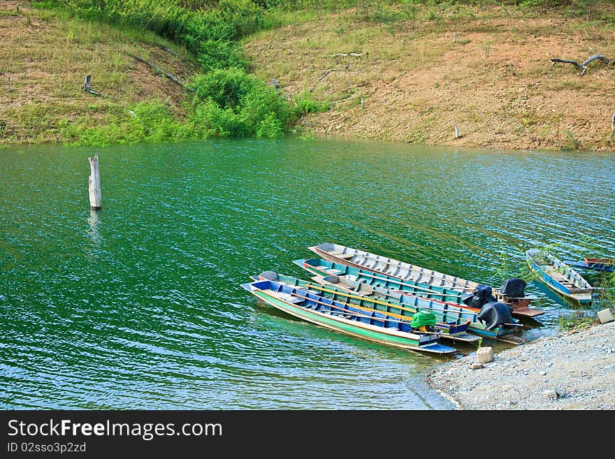 In summer ,I'm going to Sirikit's dam in Uttradhit .I see fishing boat in lake .It's beautiful. Thailand