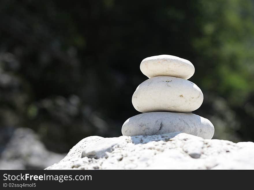 Three stones in nature with copy space