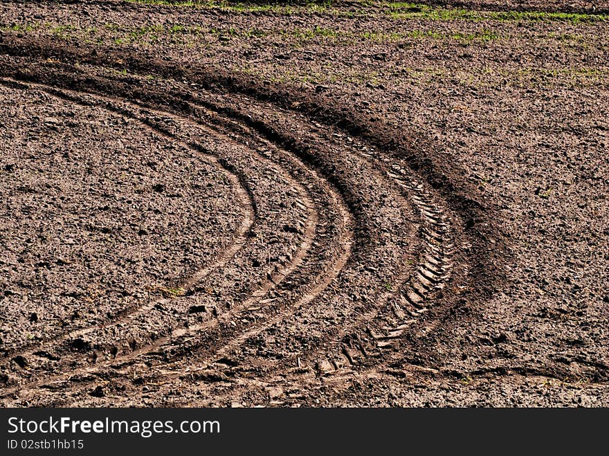 Tire track in a heap of sand