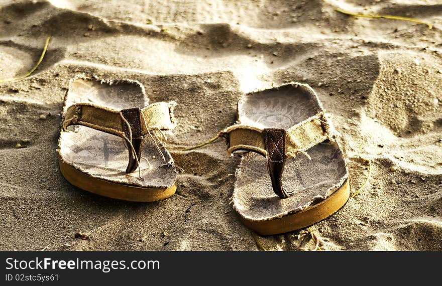 Slippers on the sand