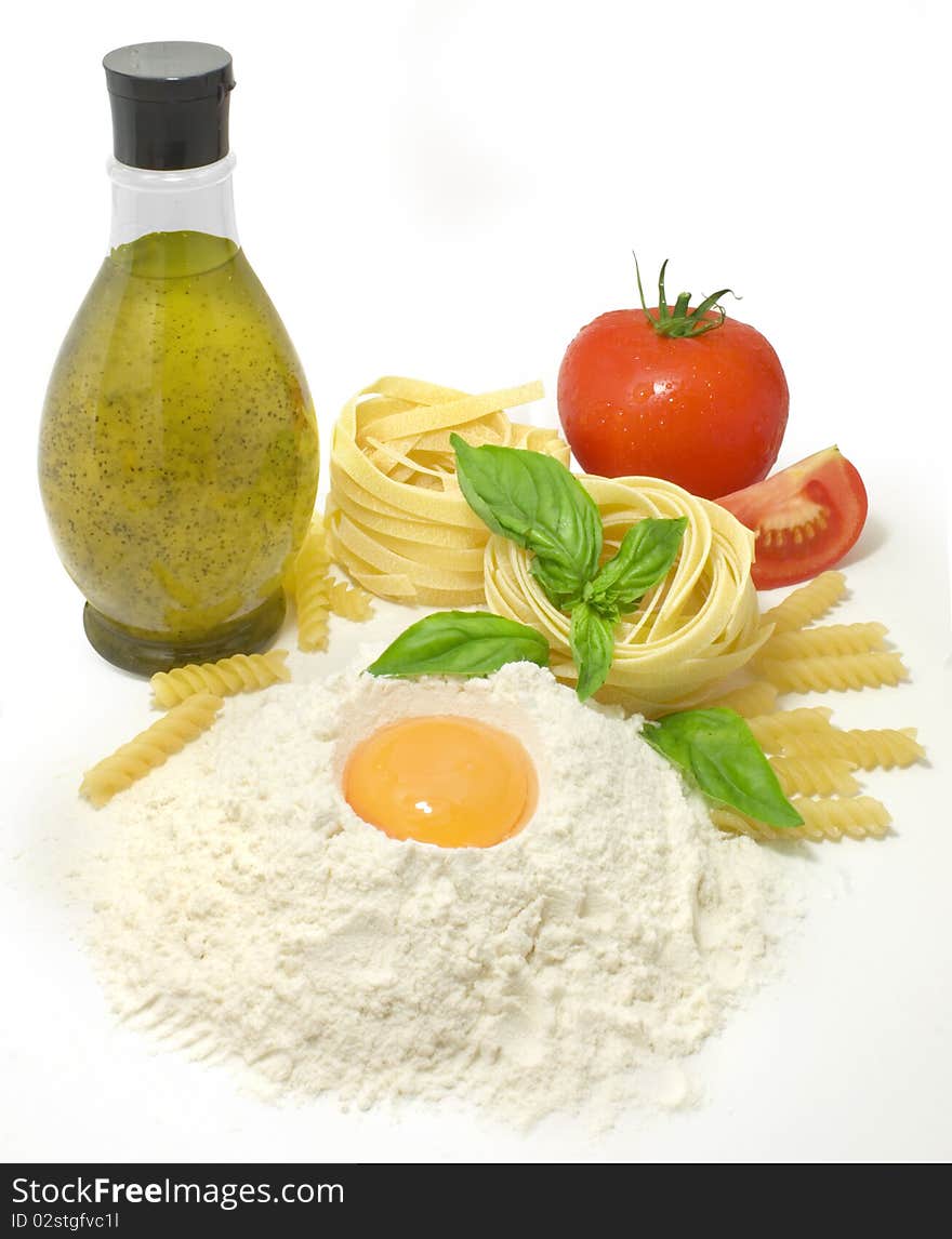 Nice fresh pasta ingredients isolated on white background