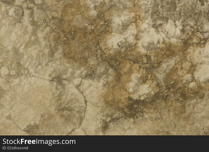 Surface of the stone. Travertine. Brown and light brown colours. Surface of the stone. Travertine. Brown and light brown colours.