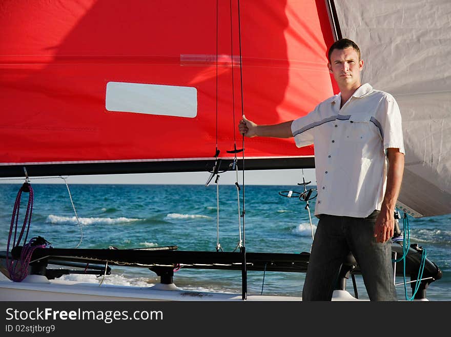 Man on sea catamaran background