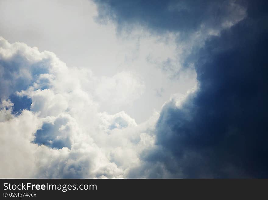 White fluffy clouds in the blue sky