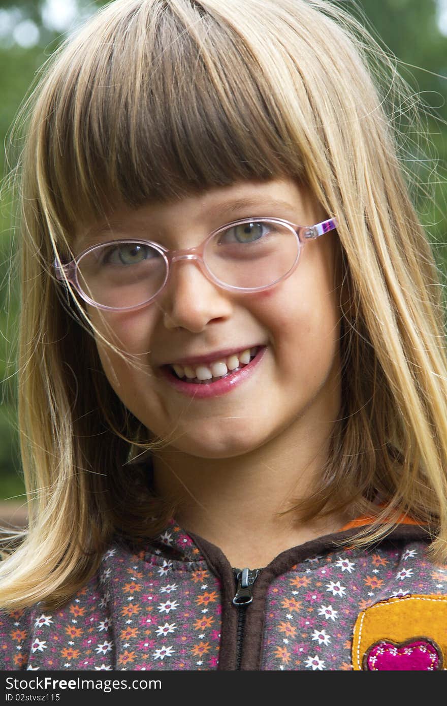 Ortrait of little girl with glasses. Ortrait of little girl with glasses