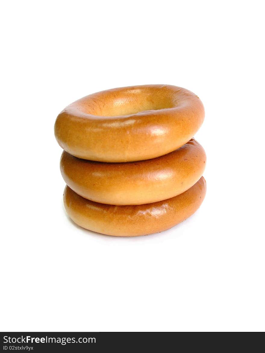 Fresh bagels, placed on each other, are shown in the picture. Fresh bagels, placed on each other, are shown in the picture.