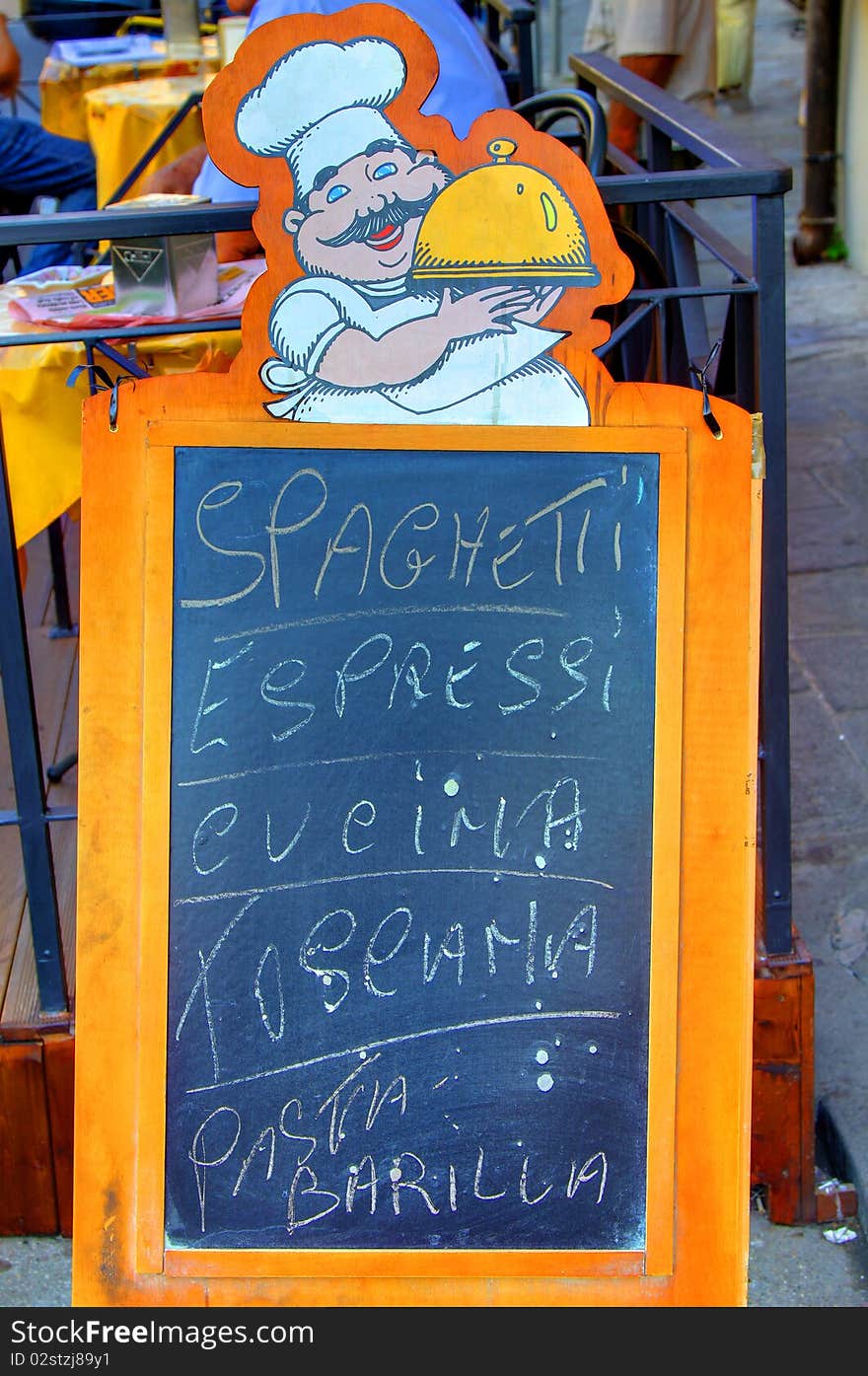 An Italian Restaurant menu board detailing Spaghetti ,Pasta and Espressi