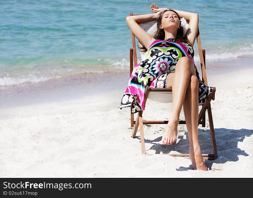 Beautiful Woman Relaxing On Beach