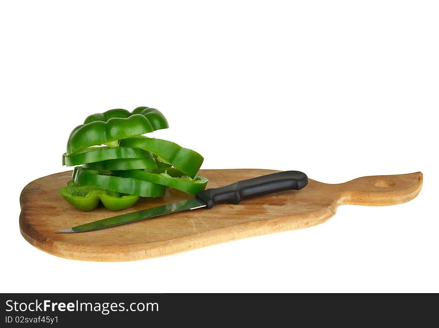 Cutting board with sliced green bell pepper