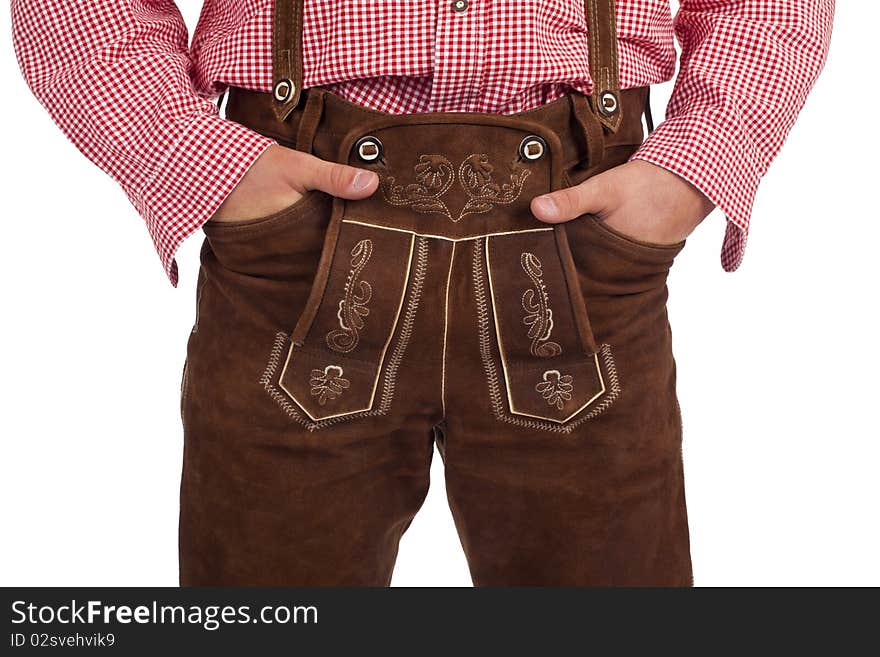 Closeup of a Bavarian man with hands in oktoberfest leather trousers (lederhose) pocket. Closeup of a Bavarian man with hands in oktoberfest leather trousers (lederhose) pocket.