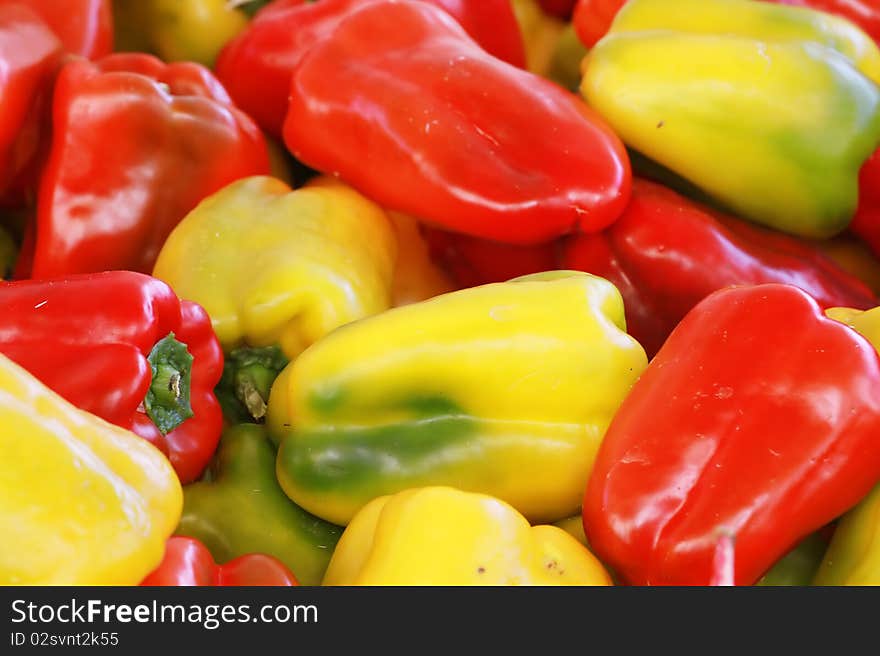 Yellow and redpeppers, good background. Yellow and redpeppers, good background