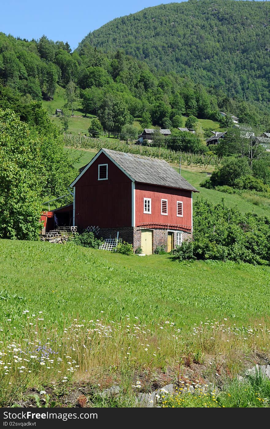 Farmer's hut in the rural countryside behind Hardangerfjord. Farmer's hut in the rural countryside behind Hardangerfjord