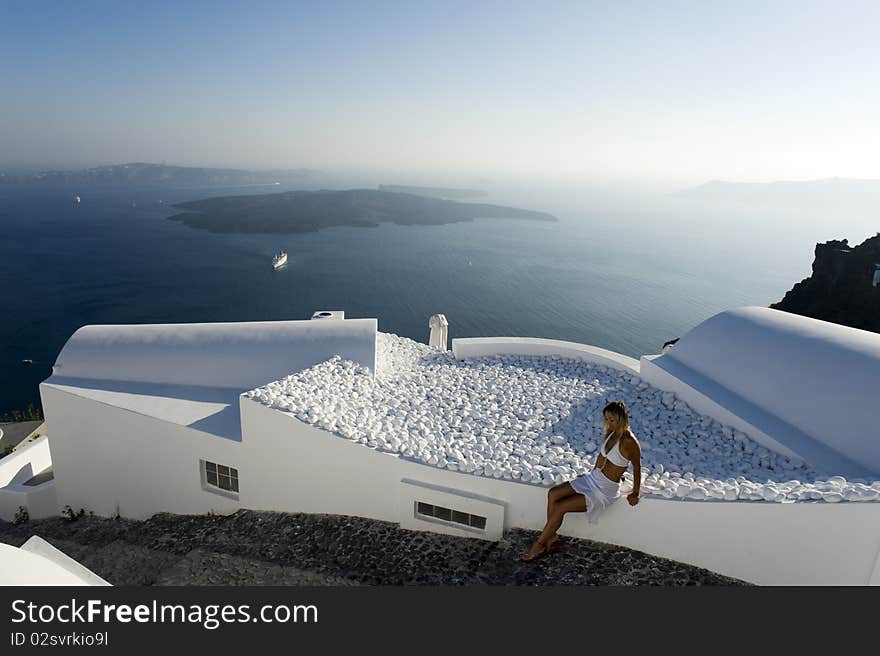 Woman In White With Santorini View