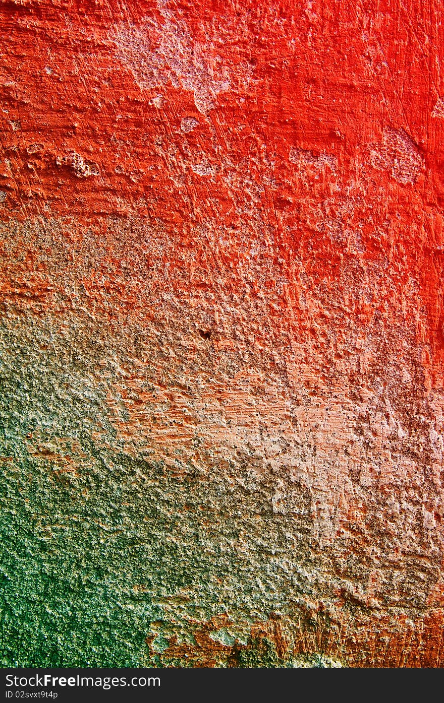 Dirty old wall covered  color paints.