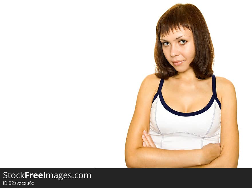 Young woman on white background. Сrossed hands