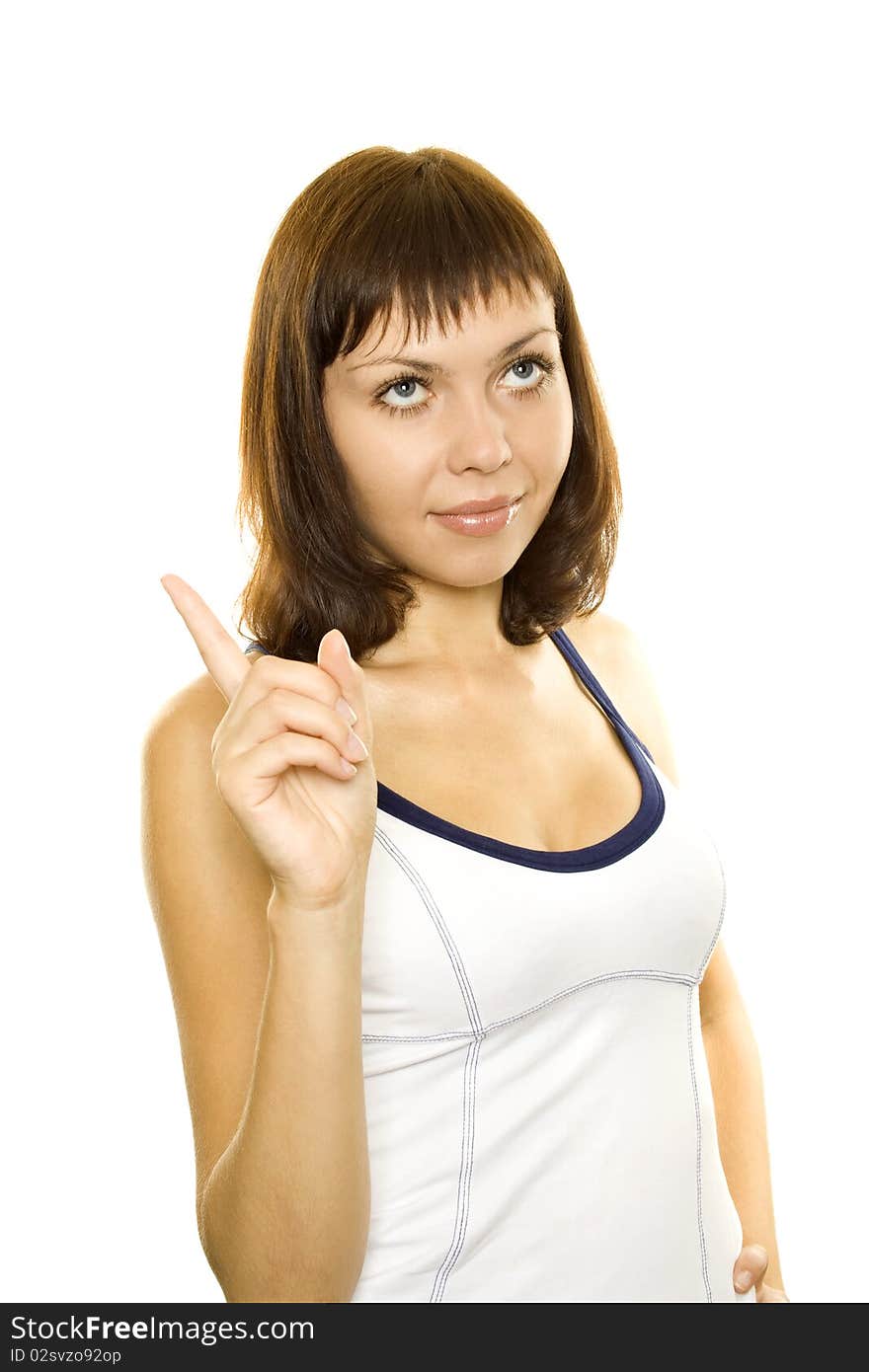 Young girl pointed a finger in the up. Isolated on white background. Young girl pointed a finger in the up. Isolated on white background